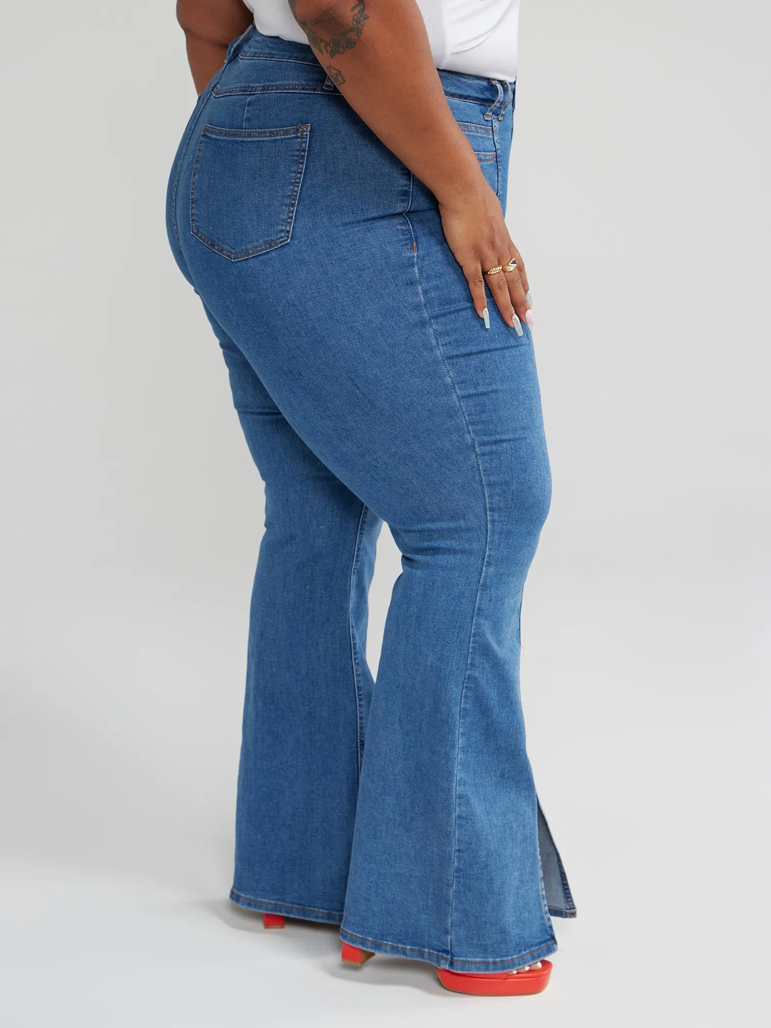 Fashion To Figure - High Rise Flare Jeans with Front Slit
